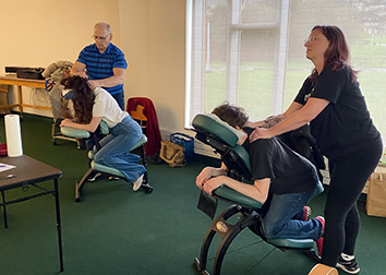 Students enjoy chair massages during a Spa Day on the SUNY JCC Jamestown Campus.
